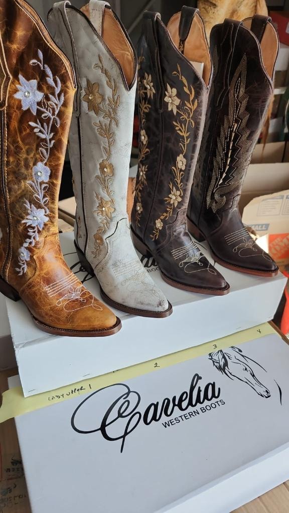 Floral embroidered cowboy boots in multiple colorways