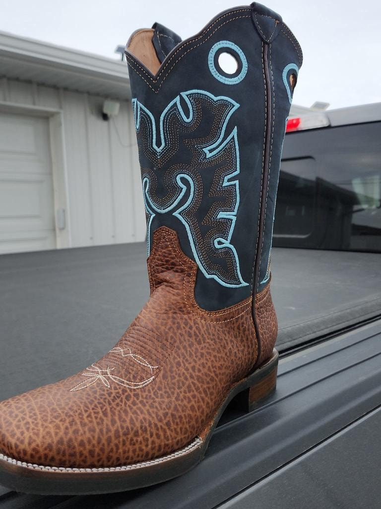Brown leather cowboy boot